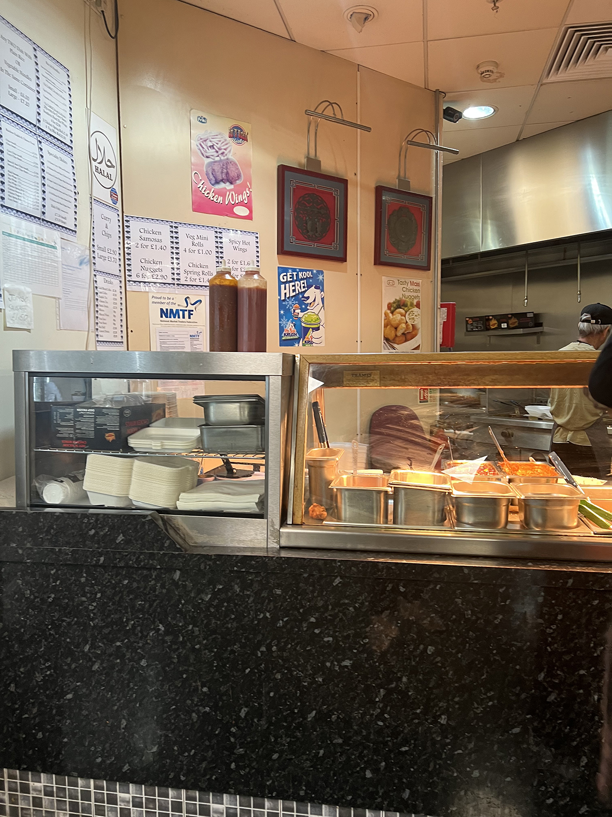 Rainbow English and Chinese stall in Stratford Village Market