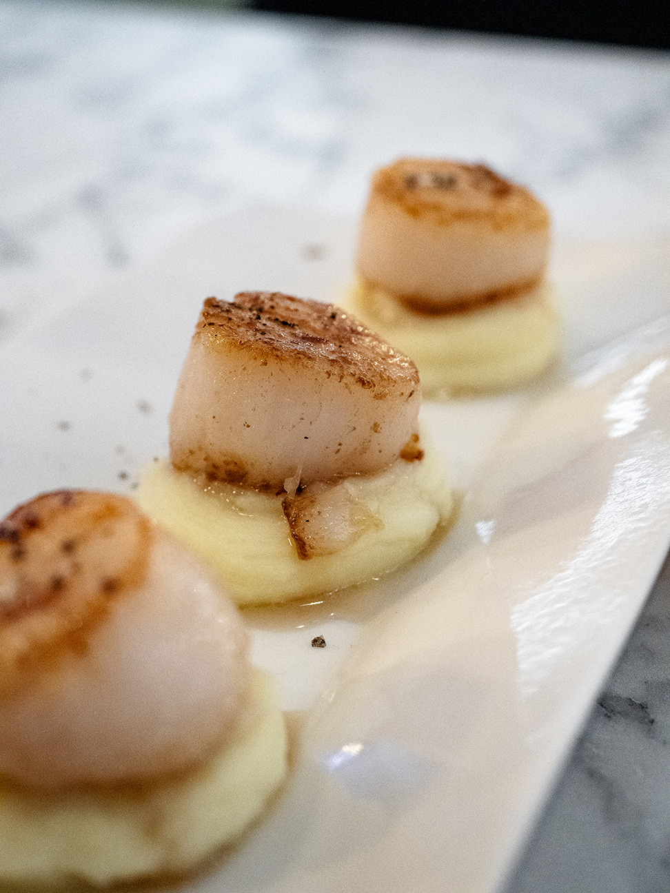 Skewd pan sear scallops