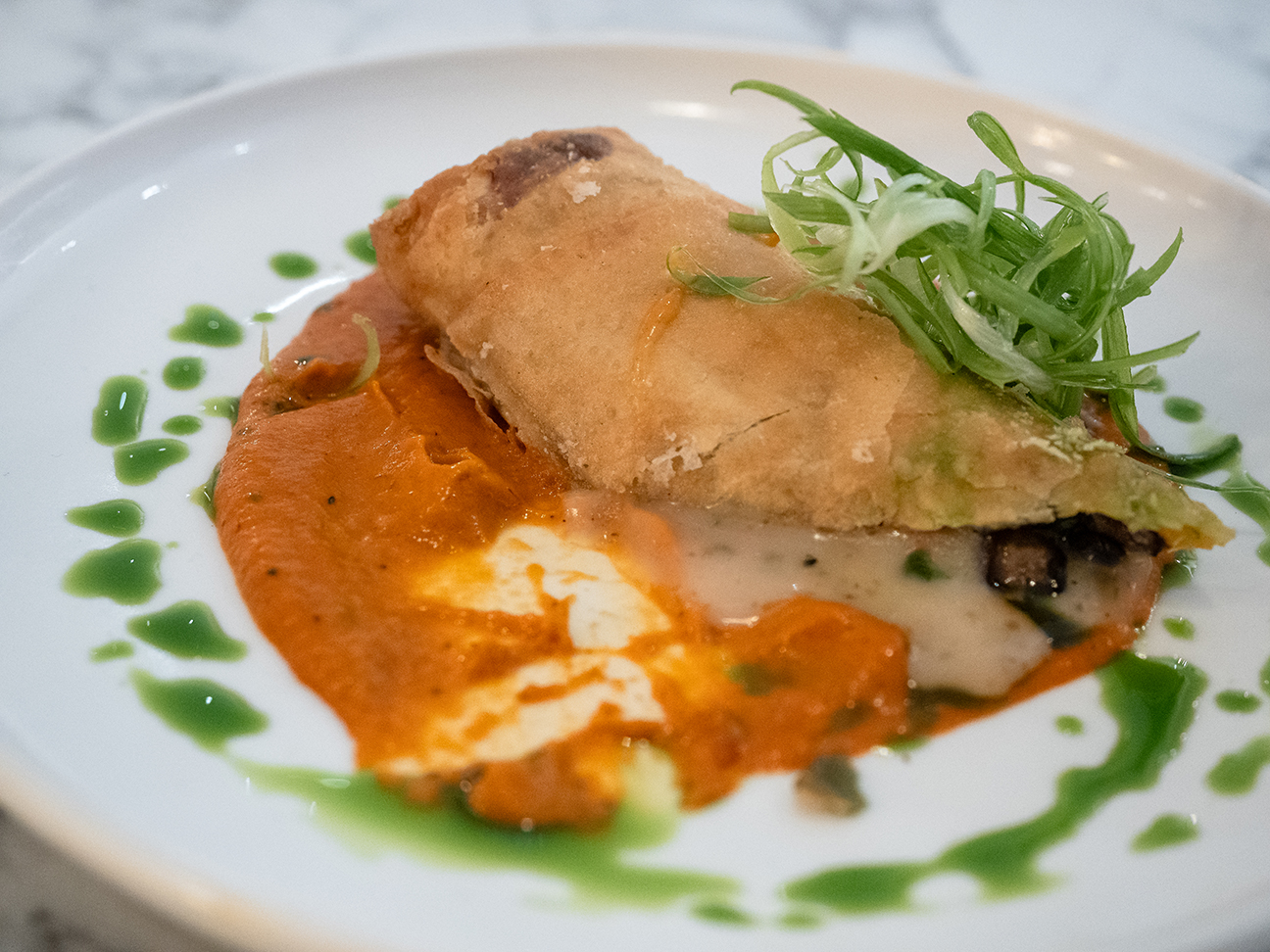 half eaten PACHANGA Turkish Spring Roll