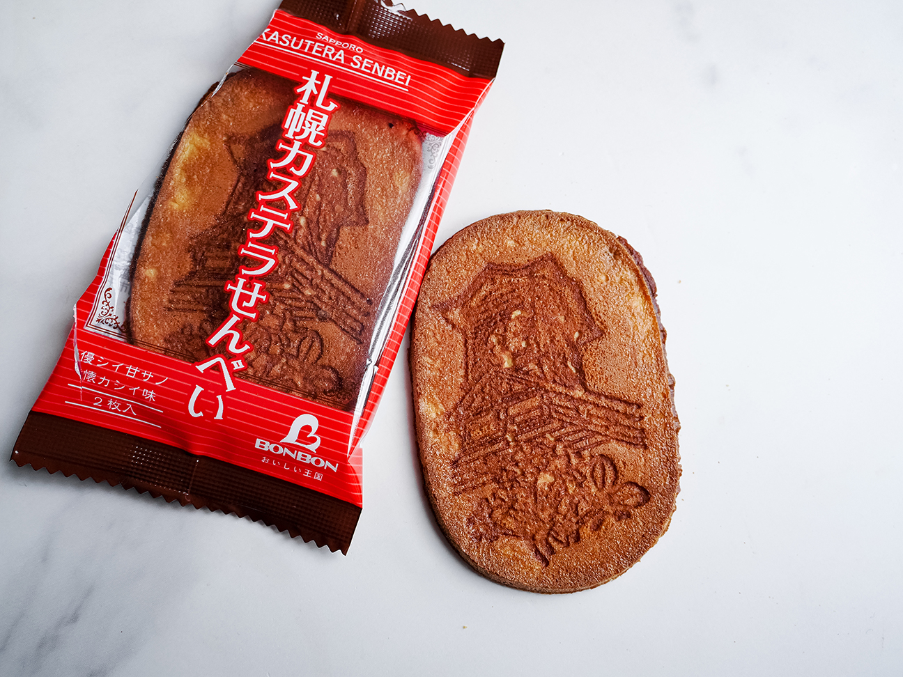 opened packet Bonbon confectionery Sapporo castellated senbei